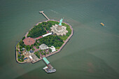 view of liberty island and the statue of liberte from a helicopter, new york harbor, state of new york, united states, usa