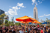 view of the empire state building from the terrace of the 230 fifth rooftop garden bar and restaurant, midtown, manhattan, new york city, state of new york, united states, usa