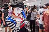 actress wearing a beret and dressed in the colors of france to mark bastille day in new york, the french national holiday of july 14th, midtown, manhattan, new york city, state of new york, united states, usa