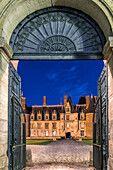 main door with the grill on the north facade, night shot, chateau de maintenon (28), france