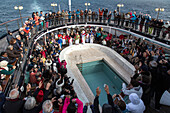 festive ceremony upon crossing the arctic circle aboard the astoria cruise ship, greenland