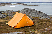 isolated tent set up along the edge of the fjord, nuuk, greenland