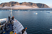 sailors on the foredeck surveying the navigation around the icebergs, astoria cruise ship, narsaq, greenland