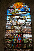 stained glass showing joan of arc in front of the burning abbey, the city of orleans and the chateau de la robertiere, breuil-benoit abbey, marcilly-sur-eure (27), france