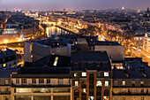 the quays of the seine at night seen from the pavilion of the arsenal, paris (75), france