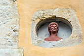 statue in a niche in the wall around the old town, belleme (61), town in the regional park of the perche, village of character, normandy, france