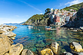 The colourful buildings and boats in Riomaggiore harbour, Cinque Terre, UNESCO World Heritage Site, Liguria, Italy, Europe