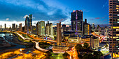 City skyline illuminated at dusk, Panama City, Panama, Central America
