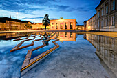 Thorvaldsens Museum reflected in the fountain of Bertel Thorvaldsen's Square at night, Copenhagen, Denmark, Europe