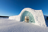 Ice building with igloo shape in the snow, Ice Hotel, Jukkasjarvi, Kiruna, Norrbotten County, Lapland, Sweden, Scandinavia, Europe
