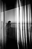 Silhouette of unrecognizable man on the deck of a ferry boat in port, Mediterranean Coast, Palma, Majorca, Balearic Islands, Spain