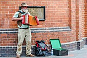 Australian musician playing outside Paddy's market, Sydney, Australia