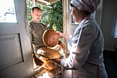 Workers of the Nikitin Kolkhoz bakery prepare bread, Ivanovka village, Azerbaijan, Bakery makes bread for local people, Children from school and kindergarden of Ivanovka eat only this bread, because it's made with natural products, We don't add any chemic