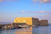 The boat lined Venetian Harbour and Fortress, Heraklion, Crete, Greek Islands, Greece, Europe