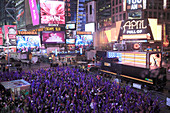 Crowds of revellers on New Years Eve, Times Square, Manhattan, New York City, New York, United States of America, North America