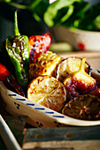 Close-up of roasted fruits and vegetables in plate