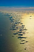 cloud formation in golden light above the south atlantic ocean