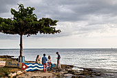 Beach at Playa Larga, young people on the beach in the evening, family travel to Cuba, parental leave, holiday, time-out, adventure, Playa Larga, bay of pigs, Cuba, Caribbean island