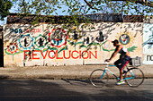 bicycle on an empty street, graffiti with Revolution written on the wall, por Siempre Revolucion, colonial town, family travel to Cuba, parental leave, holiday, time-out, adventure, Cienfuegos, Cuba, Caribbean island