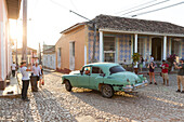 green oldtimer in the center of the city, colonial town with perfectly maintained buildings, family travel to Cuba, parental leave, holiday, time-out, adventure, Trinidad, province Sancti Spiritus, Cuba, Caribbean island