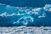 Snow and ice form a bizarre scenery with multiple shades of blue, Prospect Point, Antarctic Mainland, Antarctica