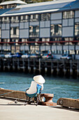 Angler in Walsh Bay at Pier One, Sydney, New South Wales, Australia