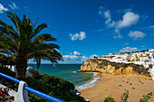 Bay with beach and colourful houses, Carvoeiro, Algarve, Portugal