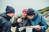 People discussing a route, greenland, arctic.