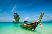 longtailboat and view to the huge rock in front of Poda beach, Andaman sea, Krabi, Thailand