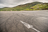 Donut tire traces at parking lot above Derrynane national park, County Kerry, Ireland, Ring of Kerry, Wild Atlantic Way, Europe