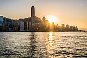 The skyline of Hong Kong Island seen trough the window of a Star Ferry ferry line during sunset, Hong Kong, China, Asia