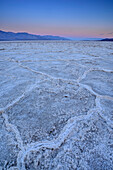 Salt deposit in salt pan at dawn, Badwater Basin, Death Valley National Park, California, USA
