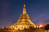 Shwemawdaw Pagoda at dusk, in Bago, Myanmar, Asia.