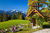 At mountain restaurant Gschwandtnerbauer near Garmisch-Partenkirchen with Alpspitze, Zugspitze, Wetterstein mountains, Alps, Upper Bavaria, Germany, Europe