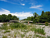 Two young girls on an Island on the river Isar next to the Muffathalle, Kabelsteg in the background, Munich, Upper Bavaria, Germany