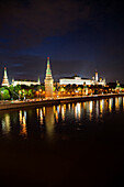 RUSSIA, Moscow. View of the Moscow River and buildings at night.