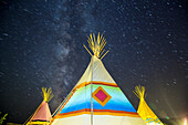 USA, Nevada, Wells, a view of the tipis and star covered sky at Mustang Monument, A sustainable luxury eco friendly resort and preserve for wild horses, Saving America's Mustangs Foundation