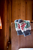 wooly pair of socks, wooden room, traditional decoration, winterly interior, warmness, the Alps, South Tyrol, Trentino, Alto Adige, Italy, Europe