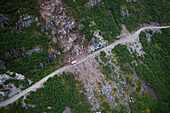 Aerial View Of A Semi Truck On The Williamsport-Pile Bay Road, Southcentral Alaska, USA