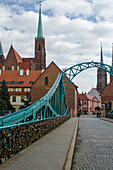 Tumski Bridge And Lovers Locks With Spires Of Cathedral In The Background; Wroclaw, Lower Silesia, Poland