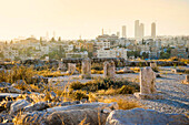 Ancient ruins of Amman Citadel with modern Amman in background, Amman, Jordan