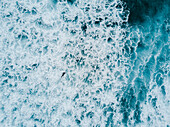 Aerial view of surfer paddling in sea, Tenerife, Canary Islands, Spain