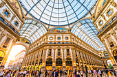 Galleria Vittorio Emanuele II, Milan, Lombardy, Italy, Tourists walking in the world's oldest shopping mall