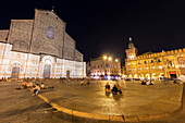 View of the San Petronio basilica, Palazzo dei Notai and Palazzo d'Accursio from Piazza Maggiore square at night. Bologna, Emilia Romagna, Italy.