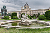 Vienna, Austria, Europe, Tritons and Naiads fountain on the Maria Theresa square with the Art History Museum in the background