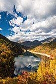 Santa Giustina lake in autumn Europe, Italy, Trentino Alto Adige, Non valley, Cles, Trento district