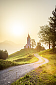 The iconic Jamik church, with Mount Triglav on the background. Jamnik, Kranj, Upper Carniola, Slovenia.