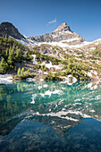 The peak is reflected in Lago Lagazzuolo, Chiesa in Valmalenco, Province of Sondrio, Valtellina, Lombardy, Italy Europe