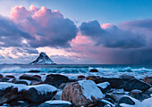 Storm at sunset from the white beach of Bleiksstranda with the Bleiksoya island in the background Bleik Andøya Vesteralen district of Nordland county Norway Europe