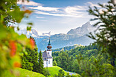 Maria Gern Church, with Bayern Alps and Mount Watzmann on the background, during sunset. Berchtesgaden, Berchtesgaden Land, Bayern, Germany.